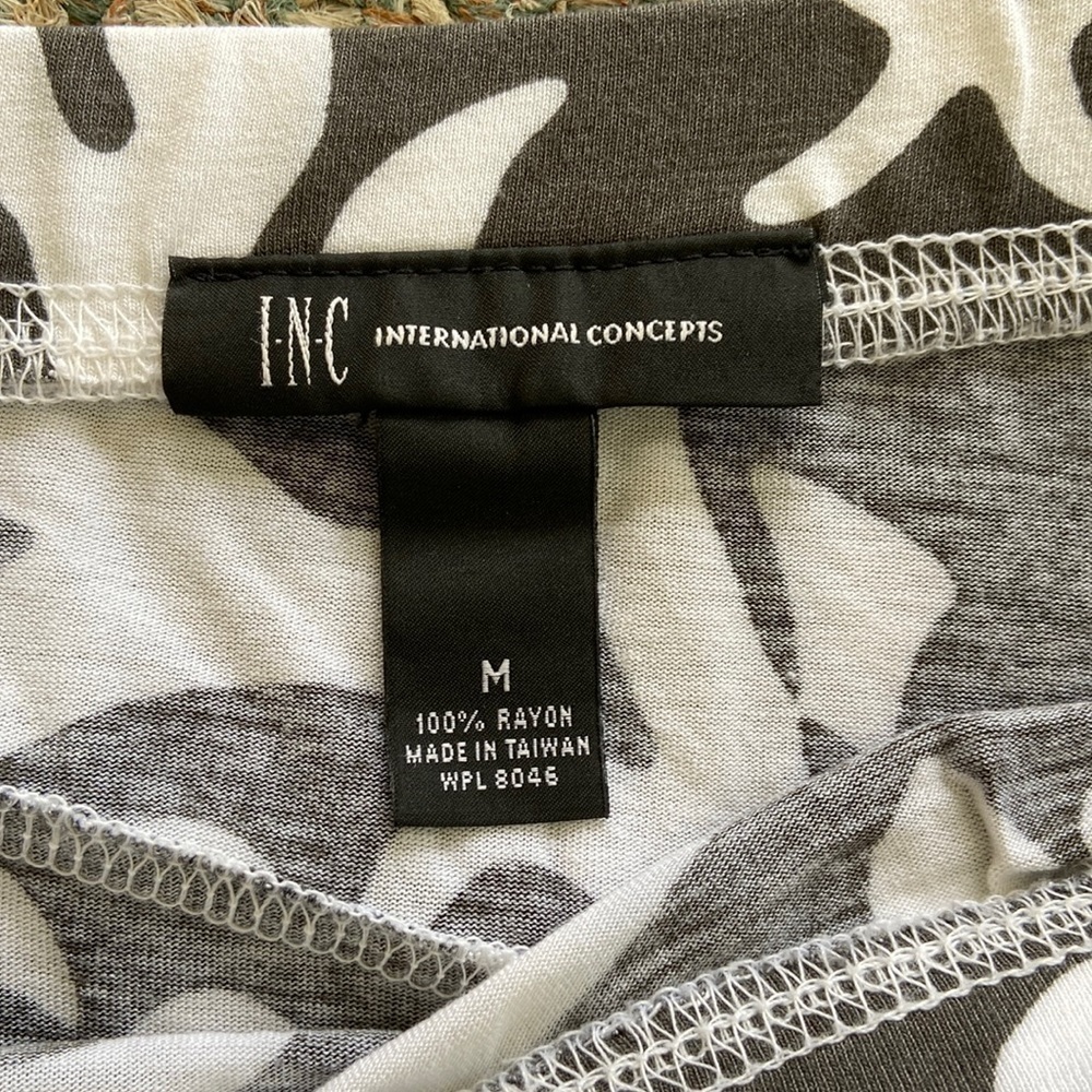 INC a line calf length skirt. Dark gray and white print and 100% rayon - Picture 2 of 3